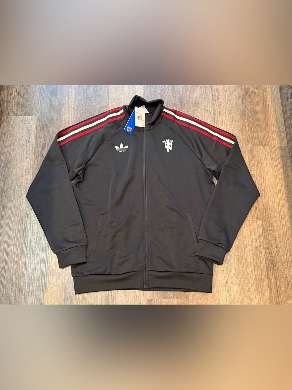 adidas Originals Manchester United Track Jacket.
- Size L Men.